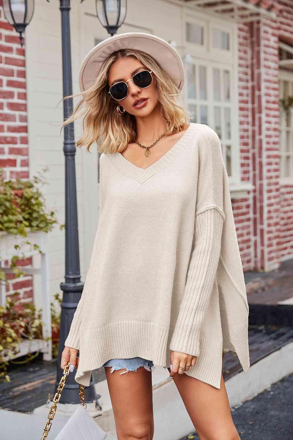 V-Neck Slit Exposed Seam Sweater - La Pink