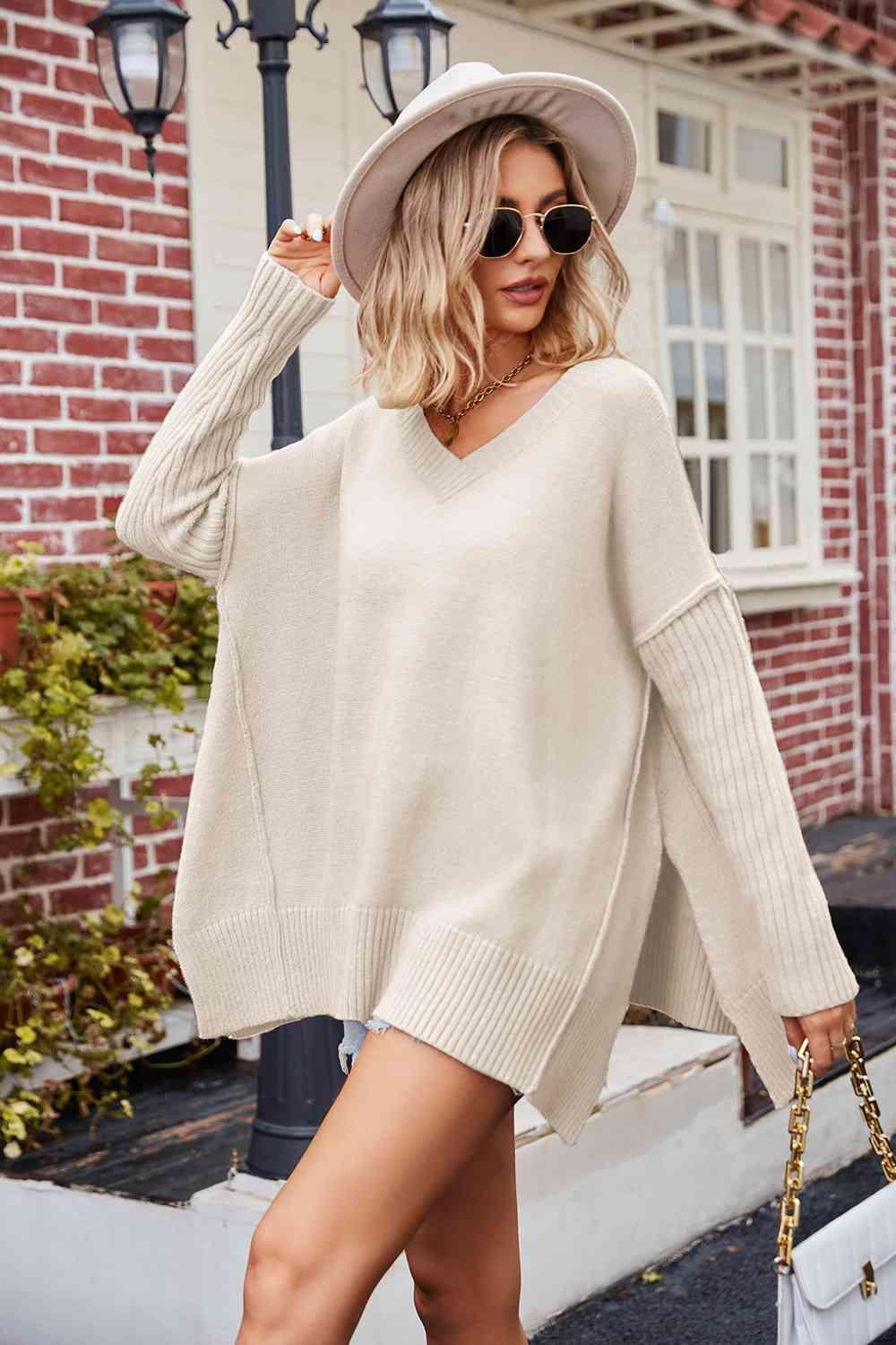 V-Neck Slit Exposed Seam Sweater - La Pink